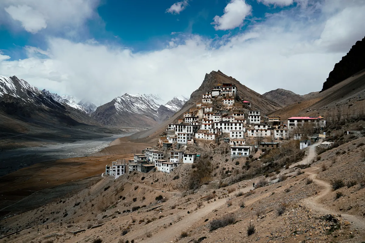 Key Monastery on its hill above the braided Spiti river, snowy peaks behind