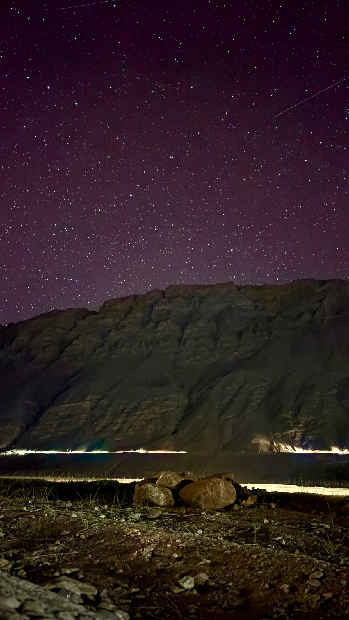 Rocks, a ridge, and more stars than you can count.